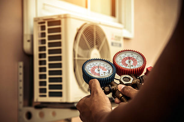 Professional Hvac Maintenance technician working in Post Falls, ID